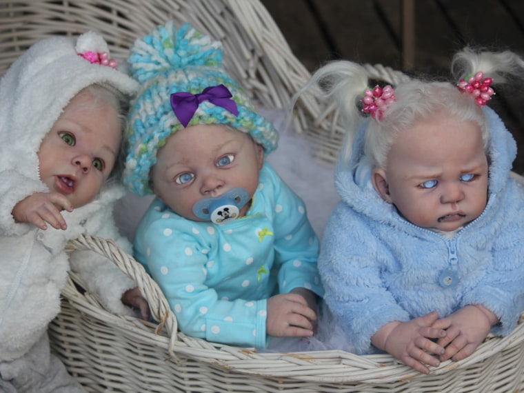 Oh look, sweet little bab-- aaaaiiiieeeeee! Reborn vampire and zombie baby dolls mix cute with creepy.