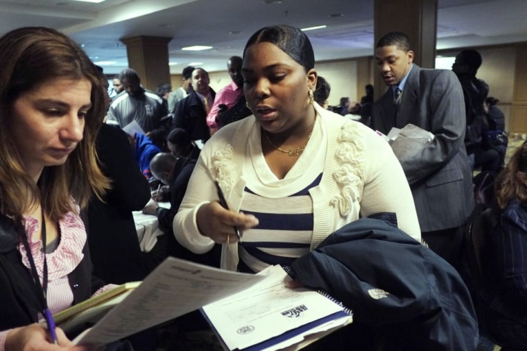 Jessica Captain, right, of East Orange, N.J., attends a job fair sponsored by Swissport, Wednesday, Feb. 6, 2013 in Newark N.J. More people quit thei...