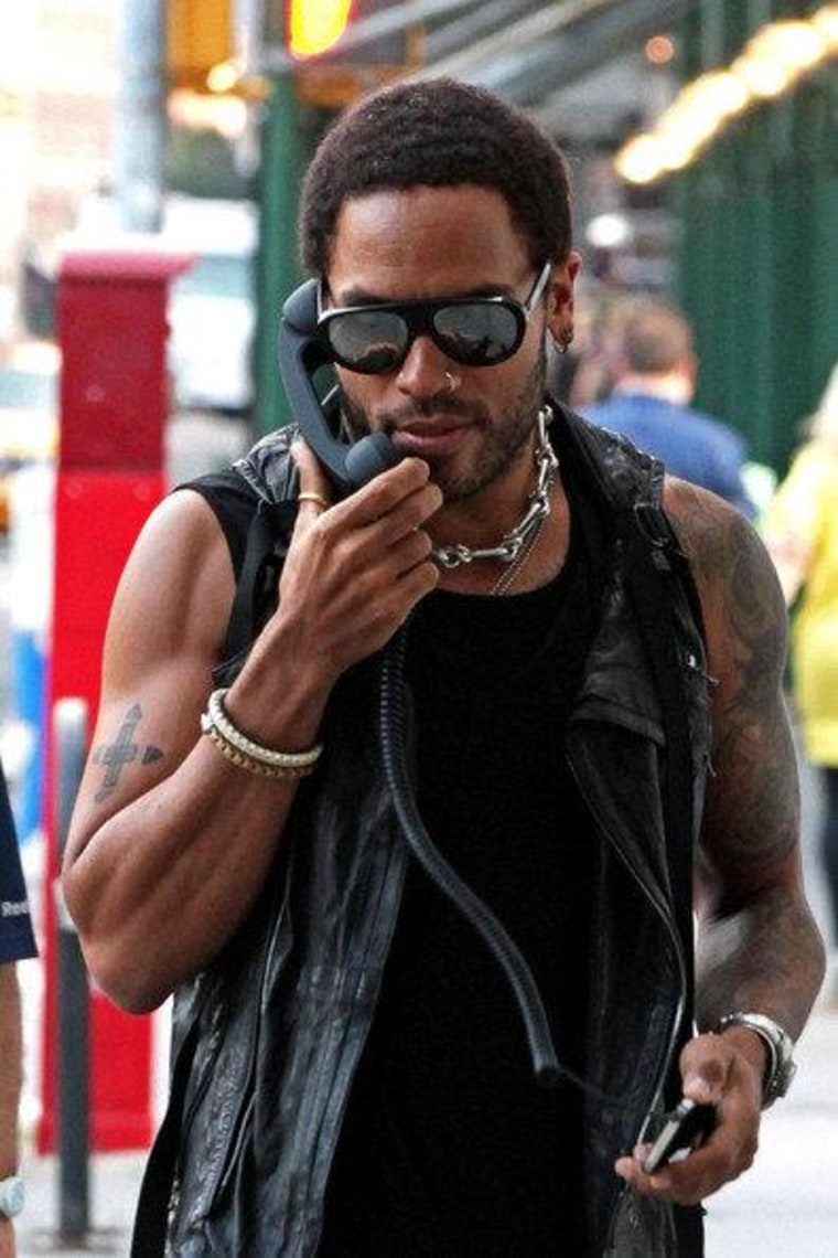 A photo of Lenny Kravitz on a Pop phone, recently shot in New York's SoHo neighborhood