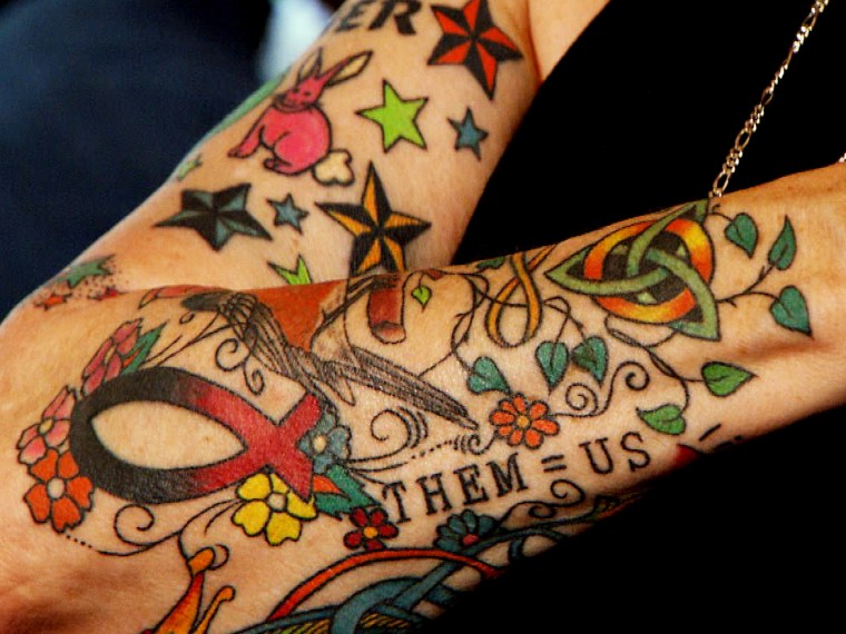 One arm's worth of the ink that Helen Lambin, 78, has gotten in just 3 1/2 years.