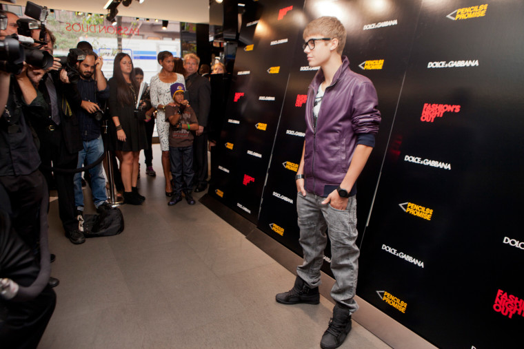 Justin Bieber at the Dolce & Gabbana store in New York for a Fashion's Night Out party September 8, 2011.