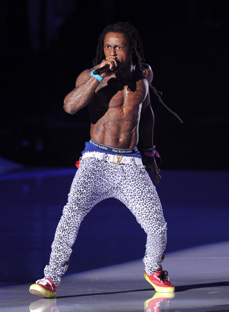 Lil Wayne performs onstage during the 2011 MTV Video Music Awards at Nokia Theatre L.A.