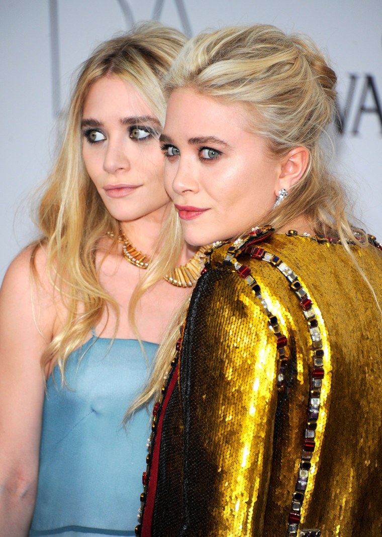 Designers Ashley Olsen and Mary-Kate Olsen, shown here at the 2011 CFDA Fashion Awards, bring luxury to a middle school staple.