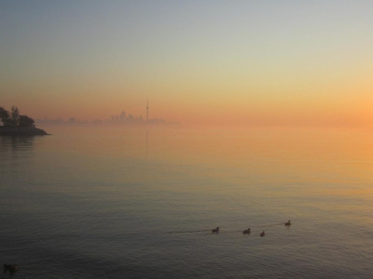Toronto as seen from the Humber River inlet at sunrise.