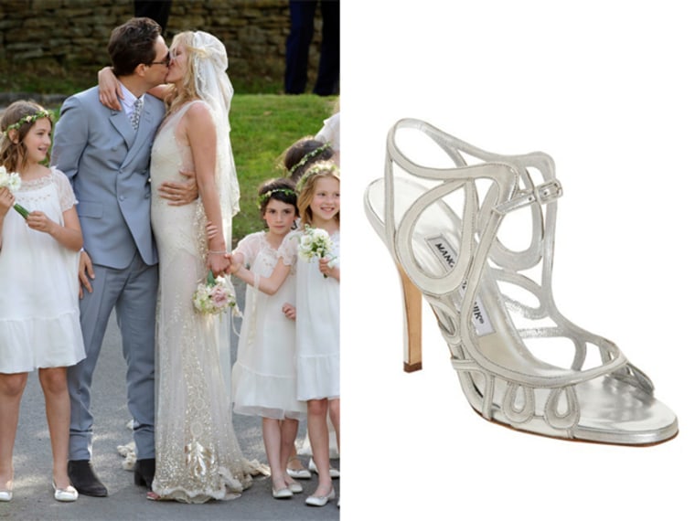 British model Kate Moss and British guitarist Jamie Hince at their wedding in Southrop, England, Friday, July 1, 2011; Manolo Blahnik Godichefac sandals.