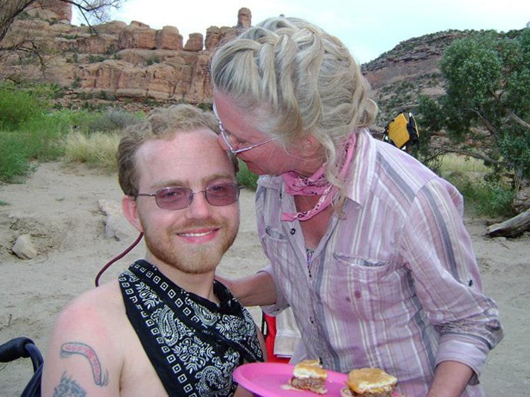 Phillip Bennett had a rare neuromuscular disease and needed a wheelchair, but that didn't stop him from traveling extensively, rappelling, snow skiing, waterskiing and skydiving. This photo of Phillip with his mom, Valerie Bennett, was taken during a white-water rafting trip on the Colorado River the year before he died.