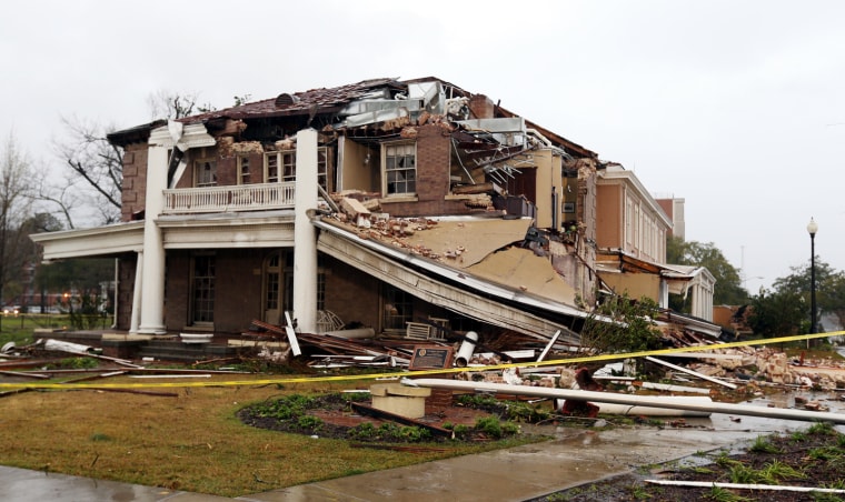 Ogletree House lies in ruins on the campus of the University of Southern Mississippi in Hattiesburg, Miss., on Monday, Feb. 11, , after a tornado struck the area Sunday afternoon. The building, built in 1912, housed the university alumni association offices.