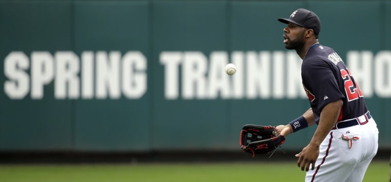 Atlanta Braves outfielder Jason Heyward catches a ball during a spring training workout on Friday, Feb. 15, 2013, in Kissimmee, Fla.