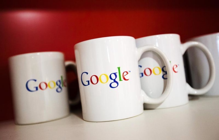 Coffee cups with Google logos are seen at the new Google office in Toronto, November 13, 2012. REUTERS/Mark Blinch