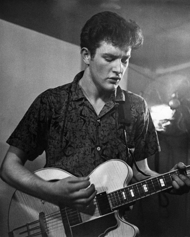 Tony Sheridan performs on stage at the 2i's Coffee Bar in Soho, London, circa 1958.