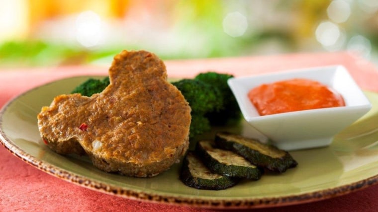 A healthy meal of Mickey Mouse-shaped turkey meat loaf and veggies is offered at Walt Disney World's Be Our Guest restuarant.