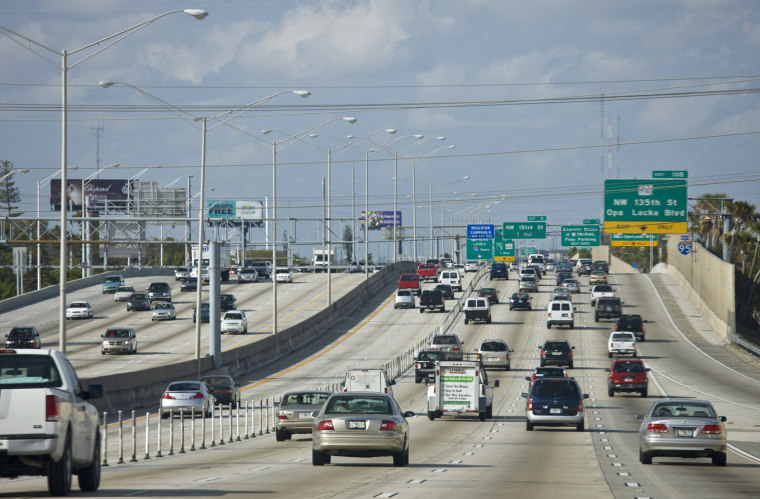 Traffic on the highway heading out of Miami at Opa Locka Boulevard, Florida, United States of America
