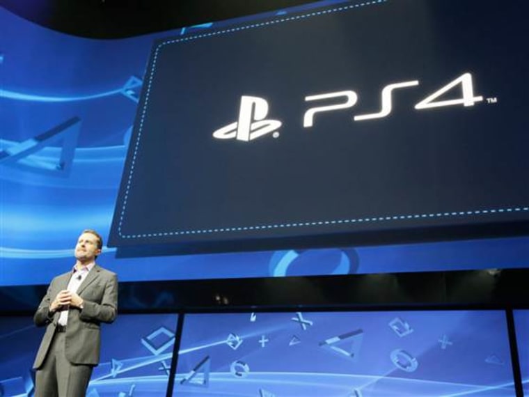 Andrew House, Presdient and Group CEO, Sony Computer Entertainment, shows of the PlayStation 4