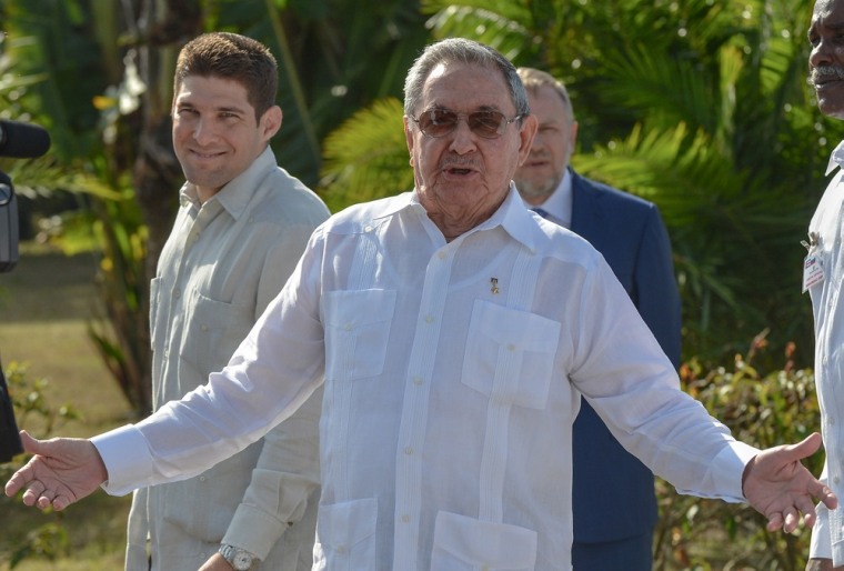 Cuban President Raul Castro visits a mausoleum Friday dedicated to Soviet solders who died around the world. Outside the frame is visiting Russian Prime Minister Dmitry Medvedev. Castro surprised those on hand when he mentioned retirement and urged reporters to pay close attention to a speech scheduled for Sunday.