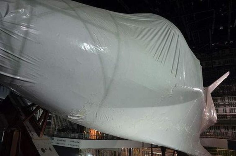 Space shuttle Atlantis, as seen shrink wrapped and angled for its display in the