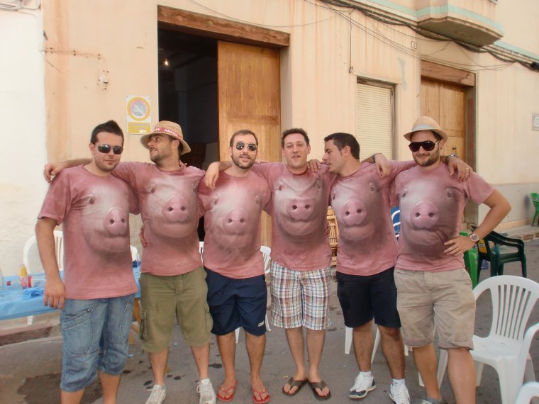 Men are pigs! Some fans of The Mountain get in touch with their inner swine.