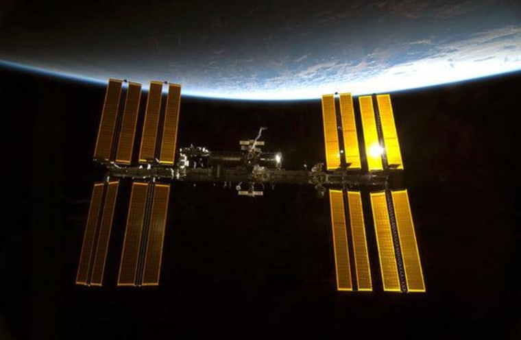 This image from a NASA space shuttle mission shows the International Space Station in orbit. The space station is the size of a football field and home to six astronauts.