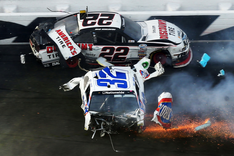 Brad Keselowski, driver of the #22 Discount Tire Dodge, and Kyle Larson, driver of the #32 Clorox Chevrolet, are involved in an incident at the finish of the NASCAR Nationwide Series DRIVE4COPD 300 at Daytona International Speedway on Feb. 23, in Daytona Beach, Fla.