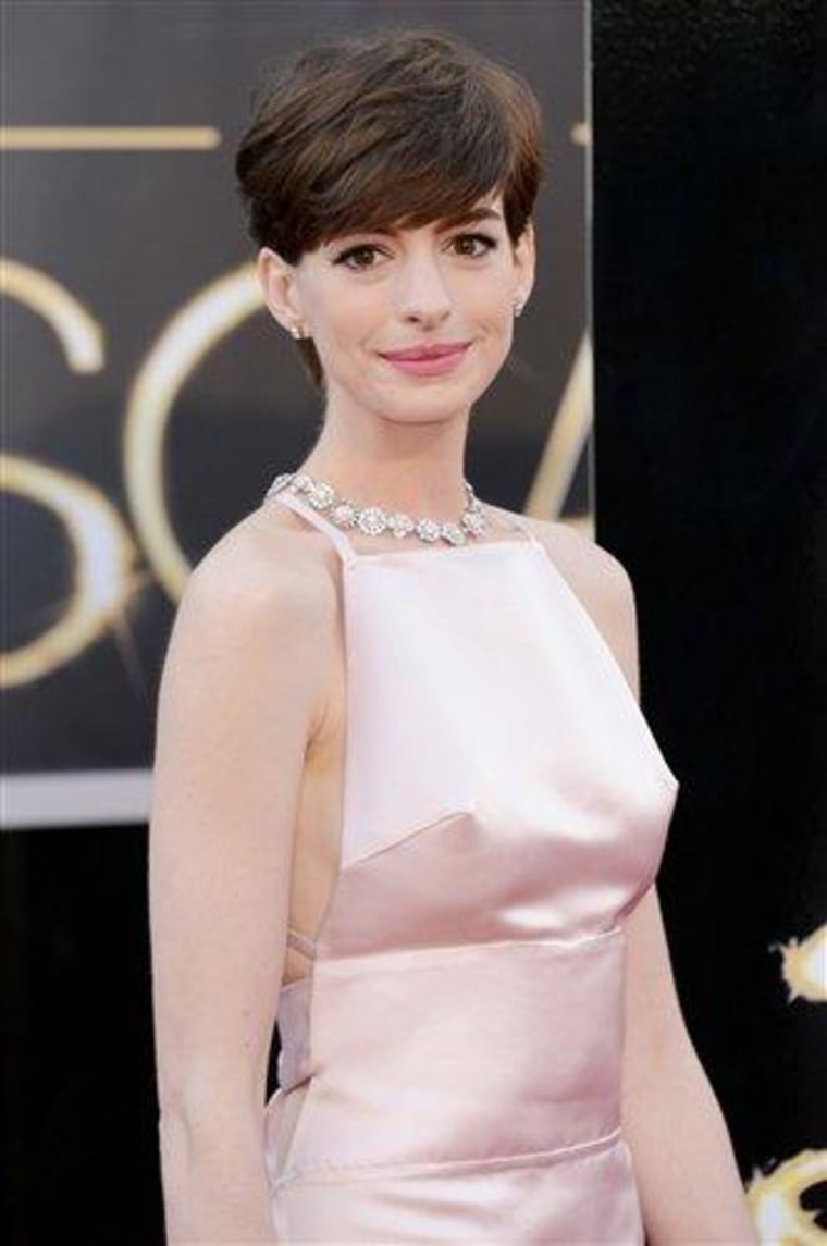 Actress Anne Hathaway arrives at the Oscars on Feb. 24, 2013 in Hollywood, California.