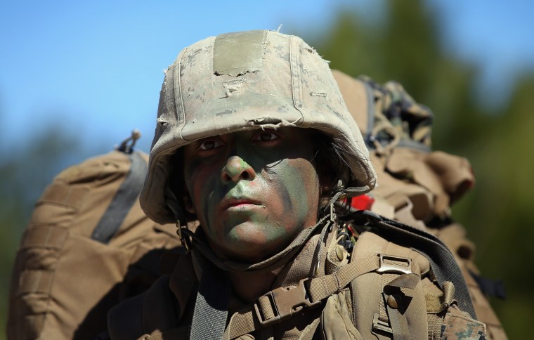 Pfc. Margarita Salinas patrols during Marine Combat Training.