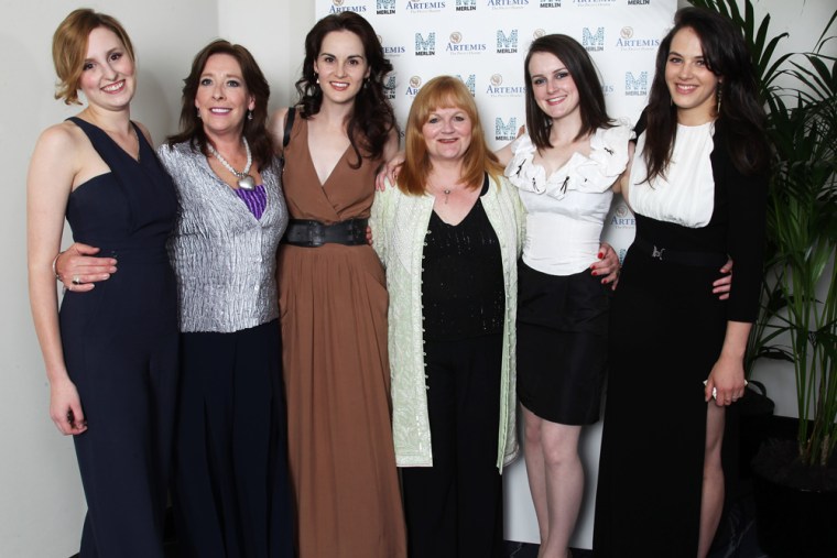 Laura Carmichael (Lady Edith), Phyllis Logan (Mrs. Hughes), Michelle Dockery (Lady Mary), Lesley Nicol (Mrs. Patmore), Sophie McShera (Daisy) and Jessica Brown Findlay (Lady Sybil) from \"Downton Abbey.\"