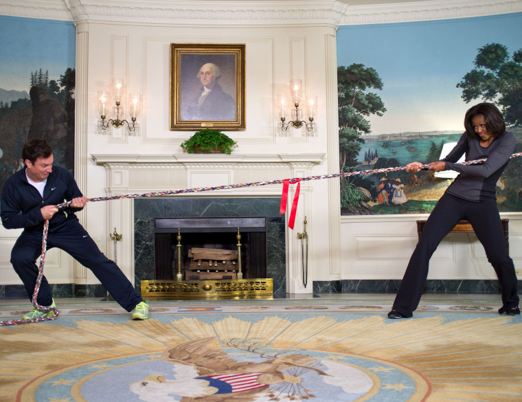 Making him work for it: Michelle Obama takes on Jimmy Fallon in the White House.