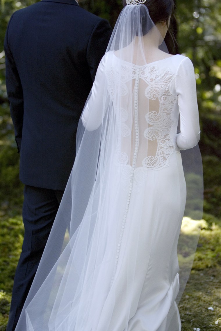 Kristen Stewart's character Bella wears a stunning Carolina Herrera wedding gown.