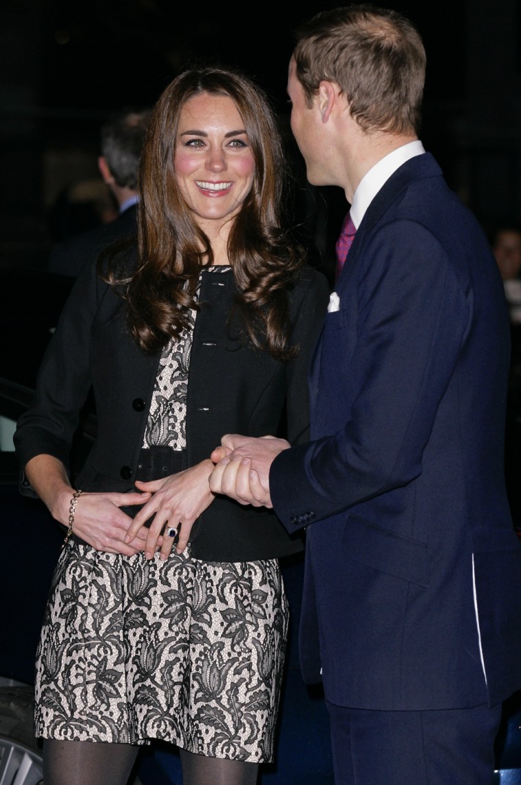 Kate's positioning of her little black clutch in front of her belly had some baby bump watchers wondering if she was hiding anything.