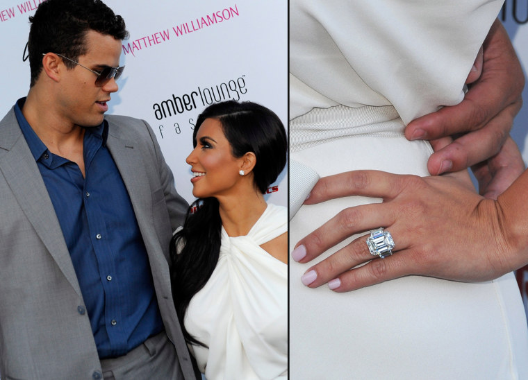 Bling it on! Kim Kardashian flaunted her engagement ring from Kris Humphries  in their first public appearance as an engaged couple on May 27, 2011.