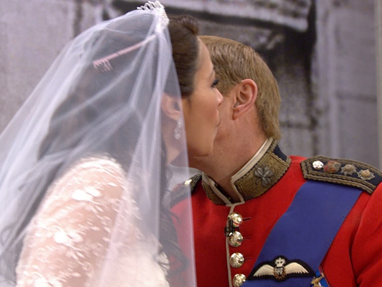 Matt as Prince William and Ann as Duchess Kate kiss on the cheek after their faux-wedding ceremony.