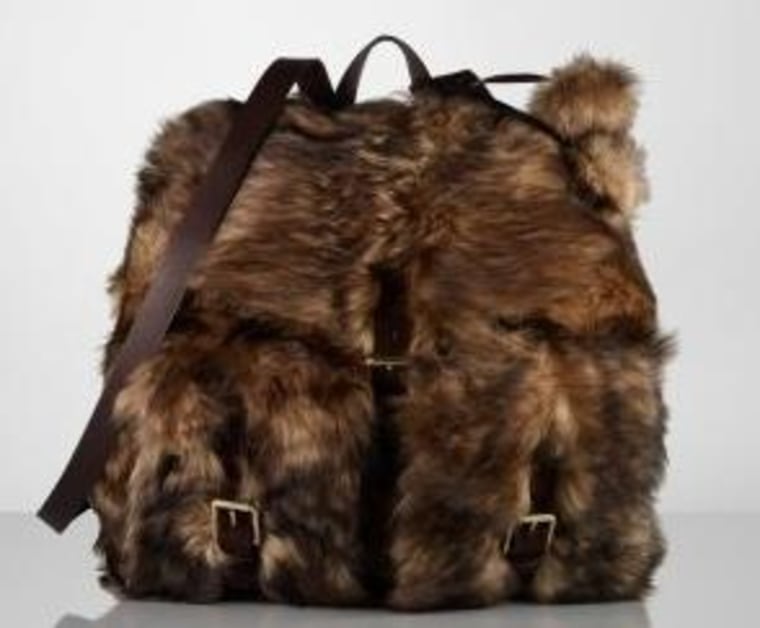 Your wallet and keys will be nice and toasty in this shearling accessory.
