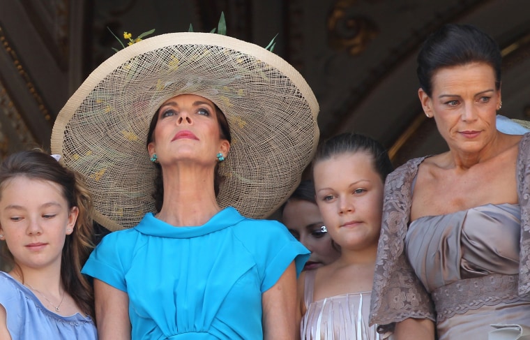 Princess Caroline of Hanover (in the hat) and her daughter Alexandra of Hanover (L), Princess Stephanie of Monaco (R) and her daughter Camille Marie Kelly Gottlieb pose on the balcony after the wedding.