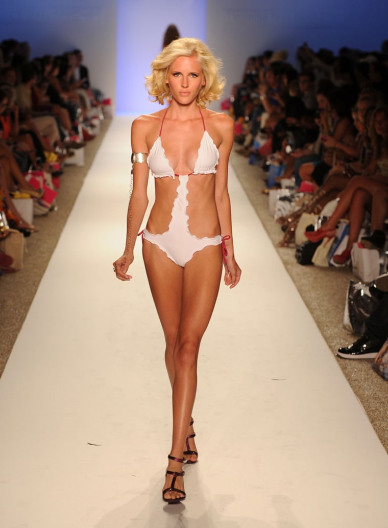 A model walks the runway at the most recent Miami Fashion Week show.
