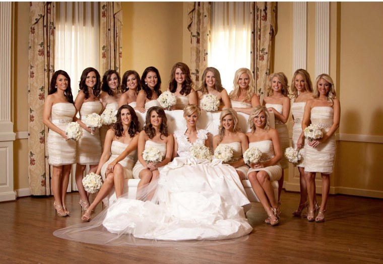 For her ceremony, Candice Crawford wore a custom-made St. Pucchi gown, while her bridesmaids each wore Badgley Mischka Couture cream silk cocktail dresses.