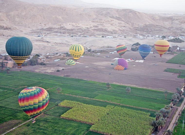Balloons float in the air in Luxor before another balloon crashed on Feb. 26.
