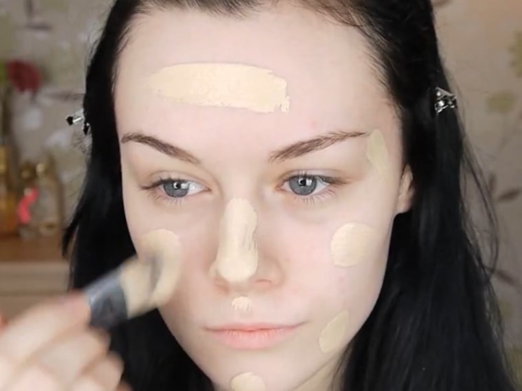 Emma Pickles, shown here applying foundation, now has a massive YouTube following. The British teen has been applauded for her creative makeup tutorials.