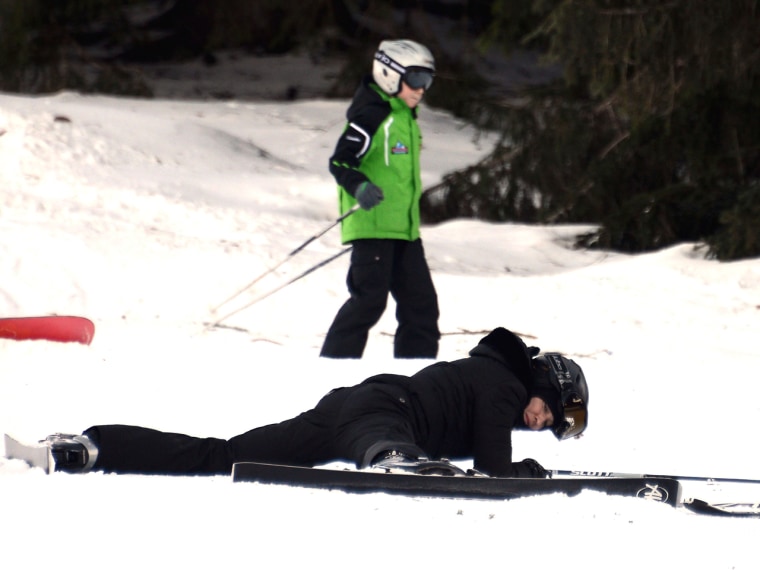 Madonna is seen sprawled in the snow during a ski trip to Gstaad, Switzerland.