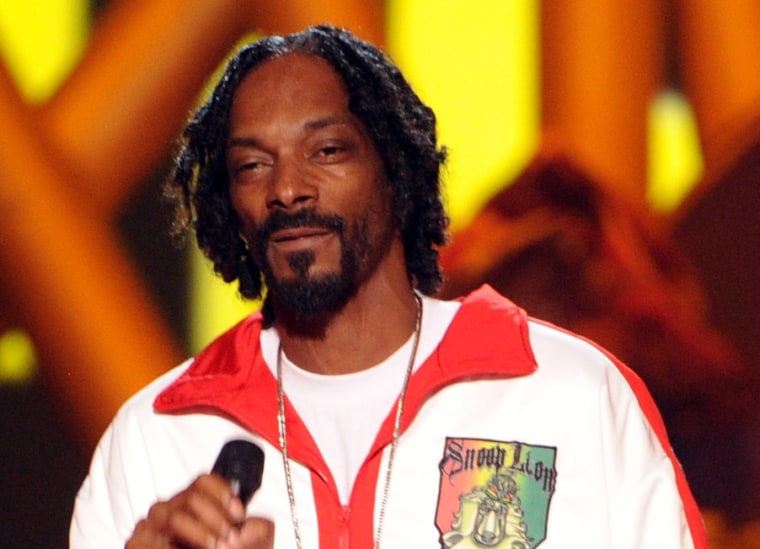 Snoop Lion (aka Snoop Dogg) says he would be happy to show his kids how to smoke marijuana if they were interested.