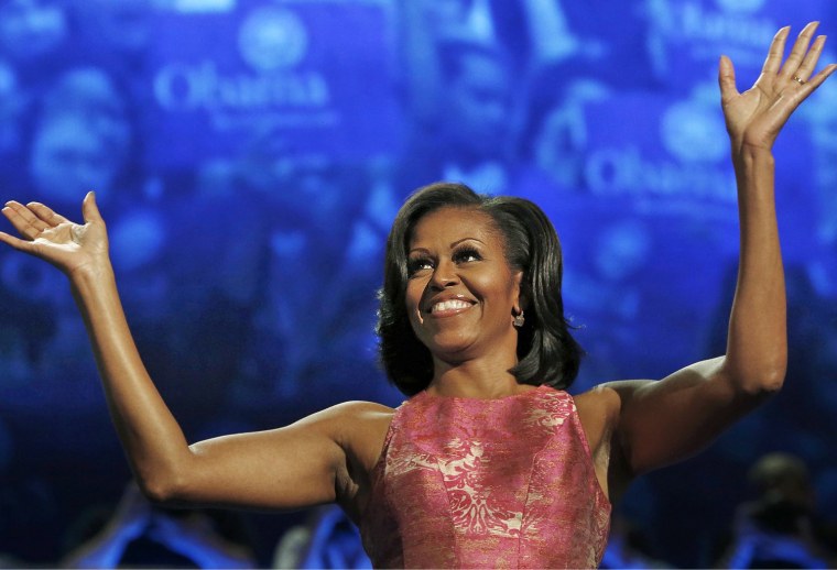 First lady Michelle Obama waves before addressing the Democratic National Convention in Charlotte, N.C., on Sept. 4. Fans quickly took to Twitter to applaud her dress.