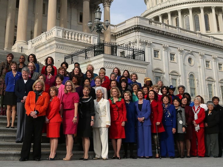 House Minority Leader Nancy Pelosi of California stands with Democratic congresswomen to highlight the historic diversity of the House Democratic Caucus on Jan. 3, 2013.