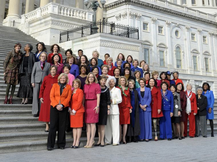 House Minority Leader Nancy Pelosi of Califorina, front row and center, poses with female House members on the steps of the Capitol in Washington on Jan. 3, 2013, before the official opening of the 113th Congress.