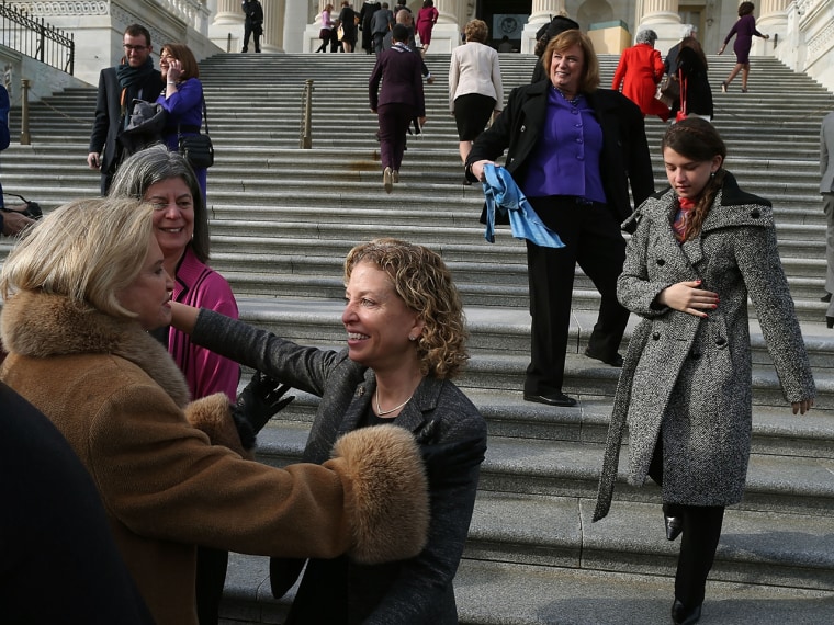 U.S. Rep. Debbie Wasserman Schultz, D-Fla., third from left, greets female members of the House Democratic Caucus after a photo op on Jan. 3, 2013 in Washington, D.C.