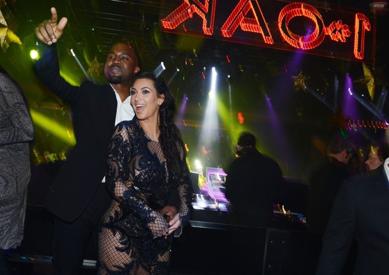 Kanye and Kim celebrate New Year's Eve at 1OAK Nightclub in Las Vegas.