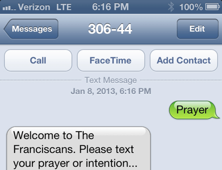 Phone screen showing text message to Franciscan friars.