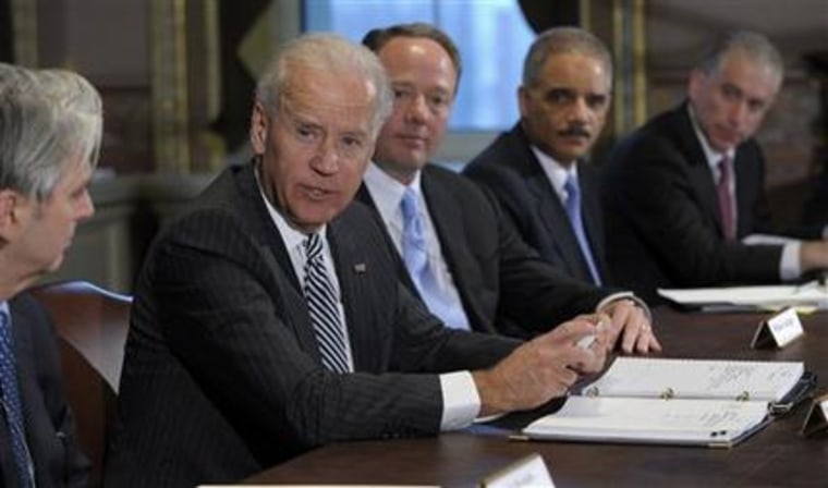 Vice President Joe Biden, second from left, with Attorney General Eric Holder, second from right, speaks during a meeting with representatives from th...