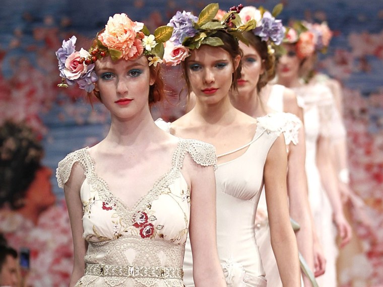 What will the most daring brides wear next season? Perhaps some dramatic pleats, a headband, or maybe even the color pink!