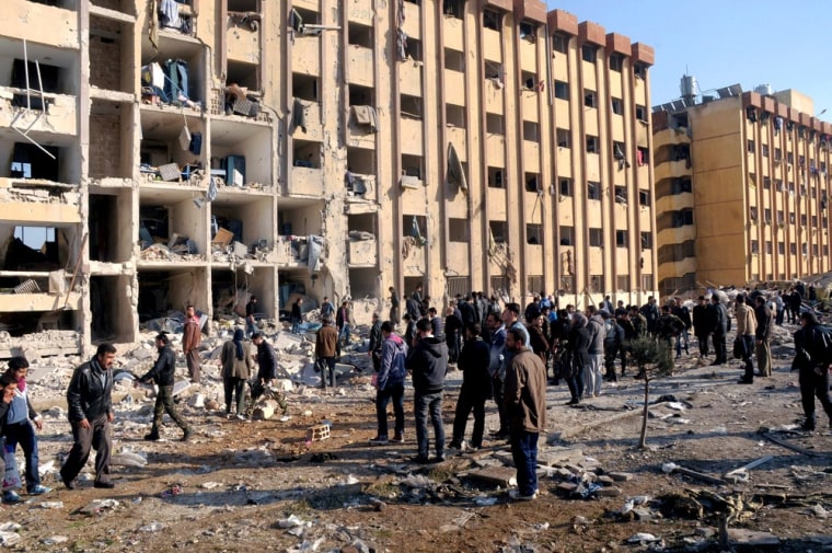 Blasts hit Syrian university, killing dozens