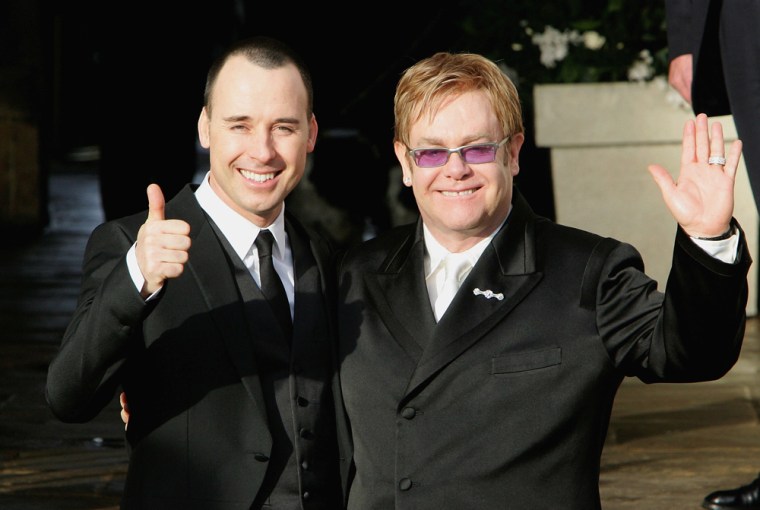 Elton John and David Furnish following their civil partnership ceremony in 2005.