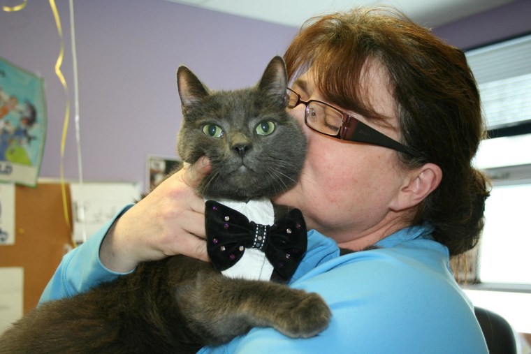 Nancy Garon bonds with Tiny on his adoption day, which took place exactly a year after she first welcomed him into her home.