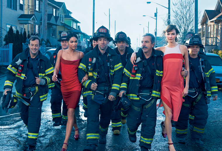 Models Chanel Iman and karlie Kloss pose with the FDNY.